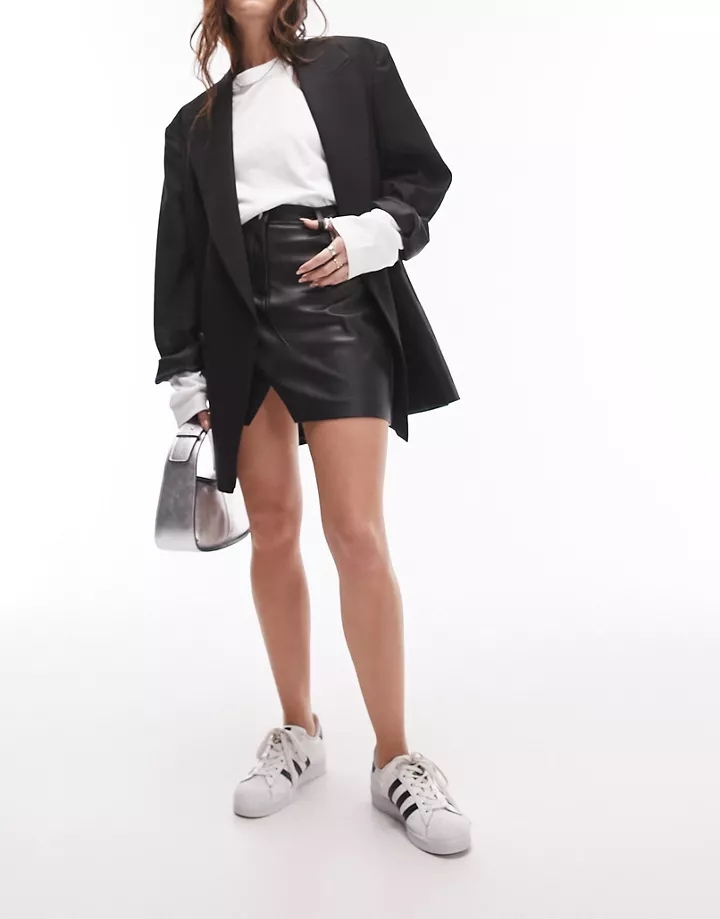 Minifalda negra estilo vaquera de tejido efecto cuero de Topshop Negro 08okLbNo