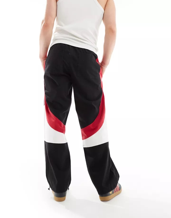 Pantalones negros estilo joggers de pernera ancha con diseño de motocross de DESIGN (parte de un conjunto) Negro 1OcLNrRP