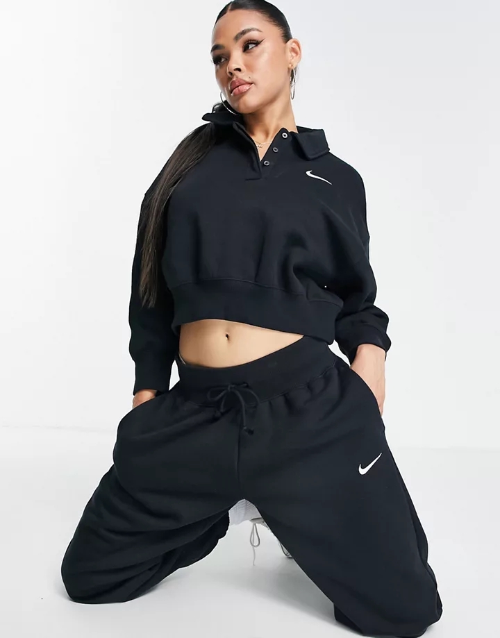 Joggers negros y blancos extragrandes de talle alto con logo pequeño de Nike Negro 9u9KNSmA